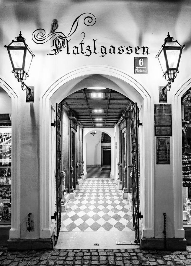 An archway with two street lamps at the Platzl: the passage to the Platzl alleys and the Platzl HotelAn archway with two street lamps at the Platzl: the passage to the Platzl alleys and the Platzl Hotel