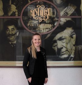Personnel officer Katharina Schmid in front of the Platzl Hotel.