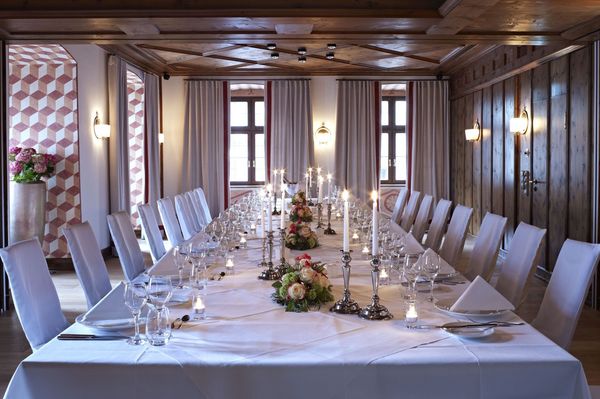 The "Müller-Pfister-Stube" in the Platzl Hotel Munich, completely paneled with Swiss stone pine, provides Bavarian charm at your event.