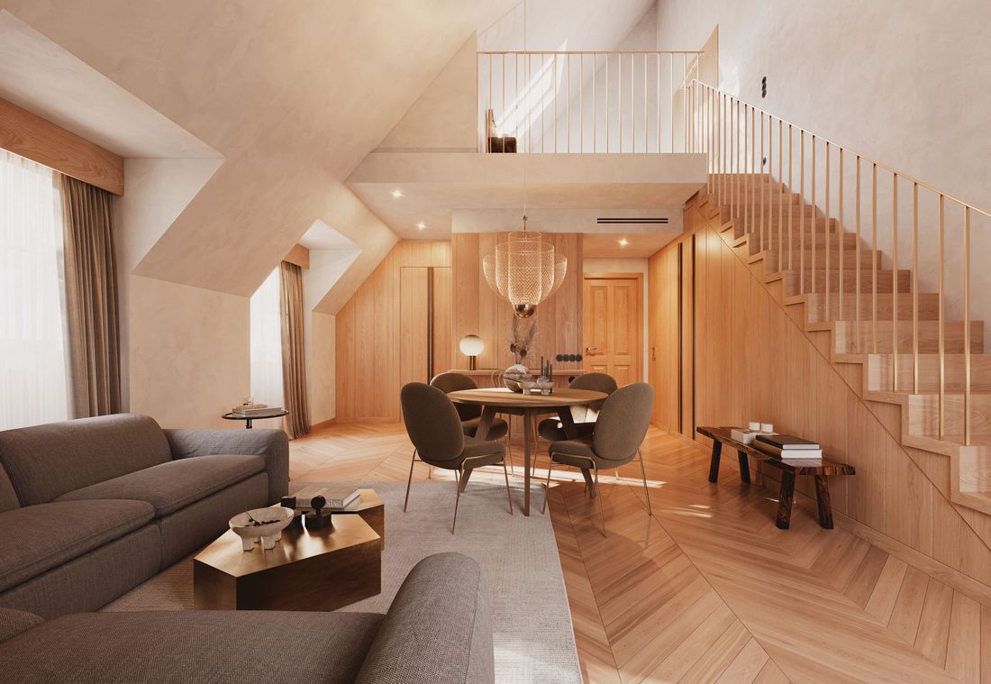 Unteres Stockwert einer Zwei-Etagen-Maisonette Suite mit Sitzmöglichkeiten in gemütlicher Wohnatmosphäre