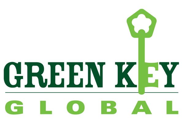 Logo: Green Key Global in bright and dark green letters 