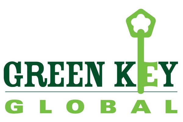 Logo: Green Key Global in bright and dark green letters 